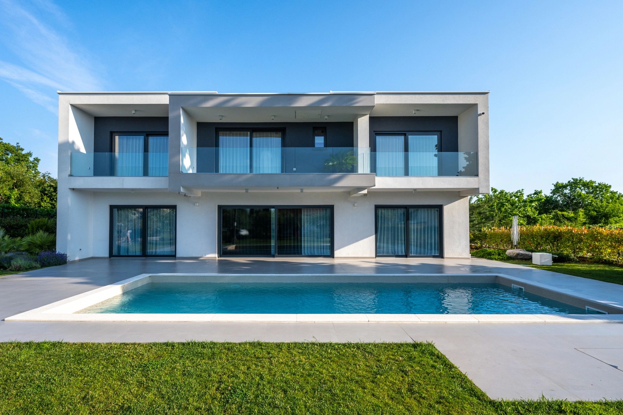 Modern home exterior with a pool