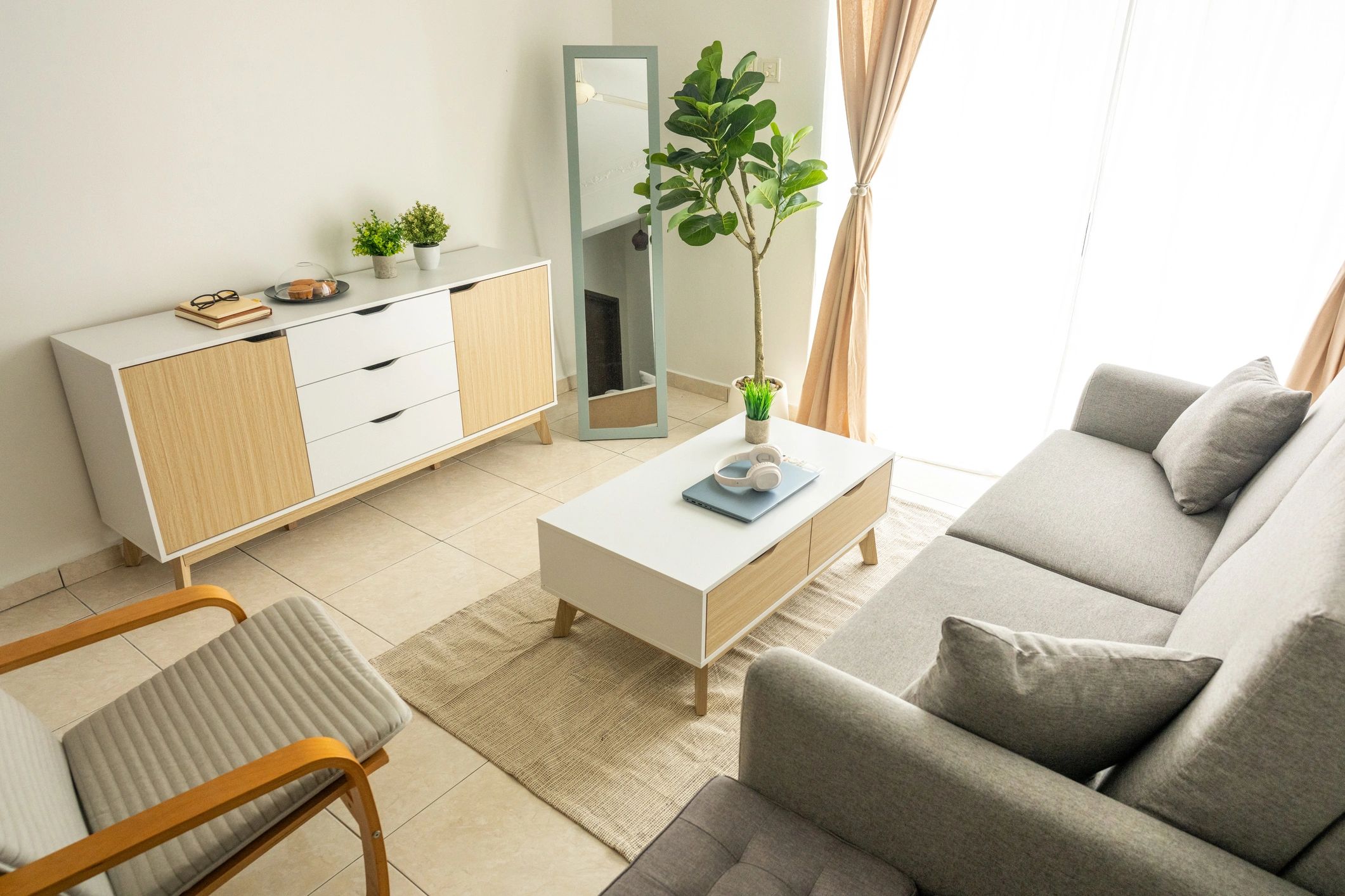 Modern living room with sofa, armchair, and coffee table